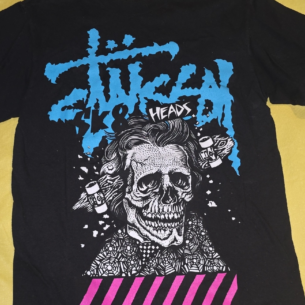 Stussy Black Tee with Vibrant Blue and Pink Design